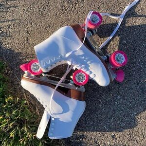 White and pink Chicago skates